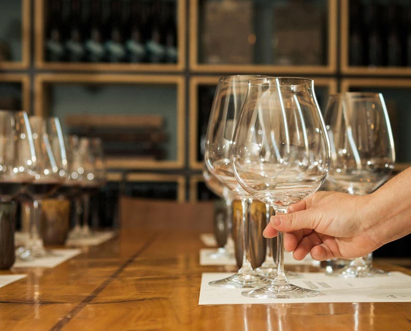 A table with wine glasses on it