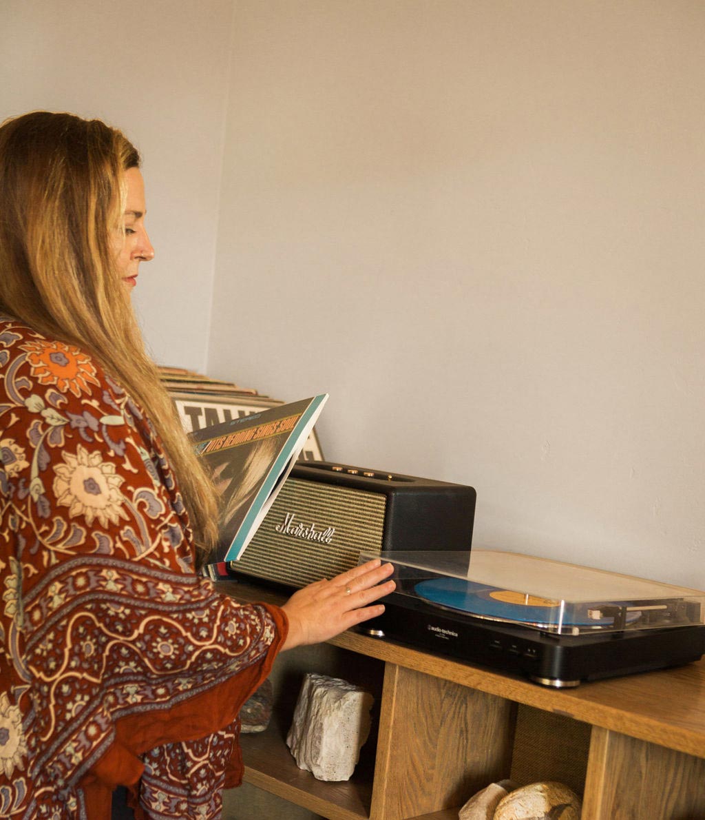 Katie using the record player